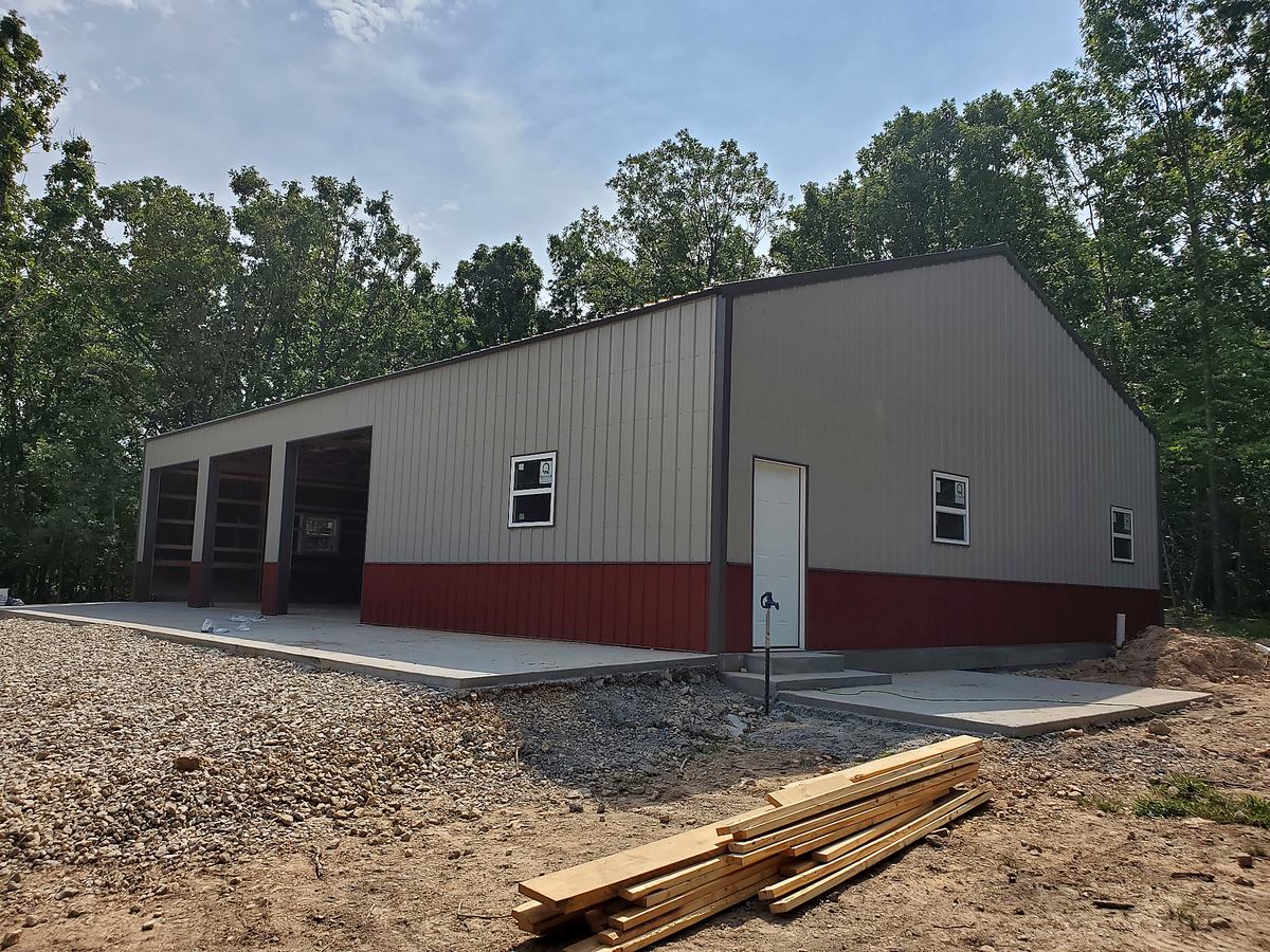 Completed metal pole barn with multiple bays