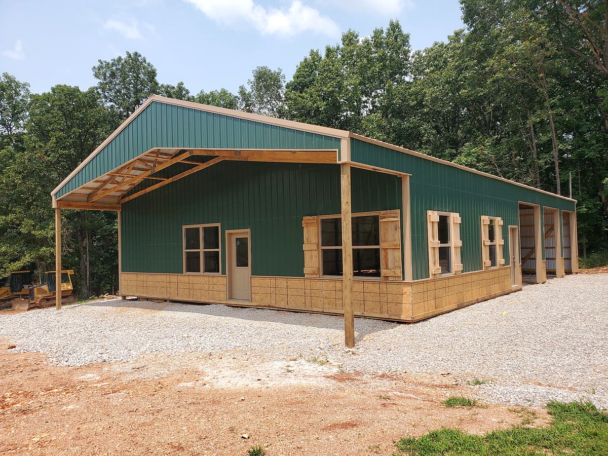 Green pole barn during exterior finish work